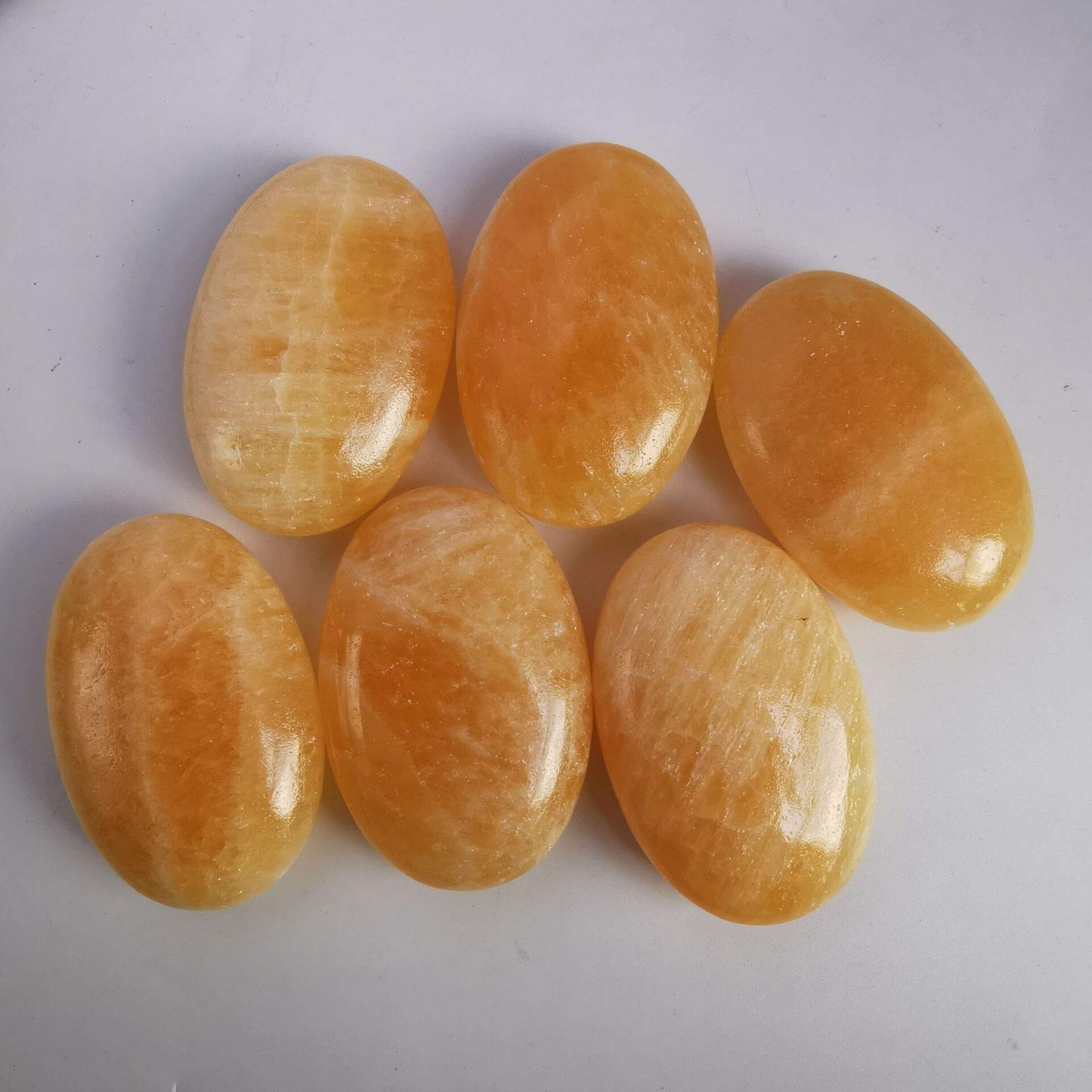 Loveliome Natural Ice Yellow Jade Oval Polished Worry Stones, Healing Crystal Indoor Fountain Stones Massage Energy Anxiety Relief Items