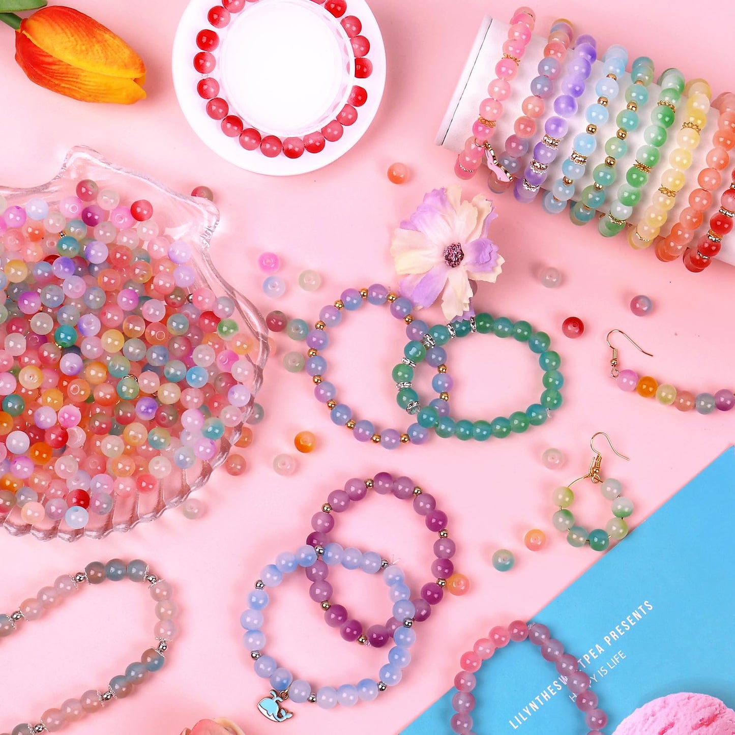 Wuollgess 1700Pcs 8mm Glass Beads for Jewelry Making,Round Bracelet Making Kit in 48 Colors with Gold Silver Spacer Beads, Charms & Elastic String, Friendship Bracelet Bead Kit for Adults and Crafters