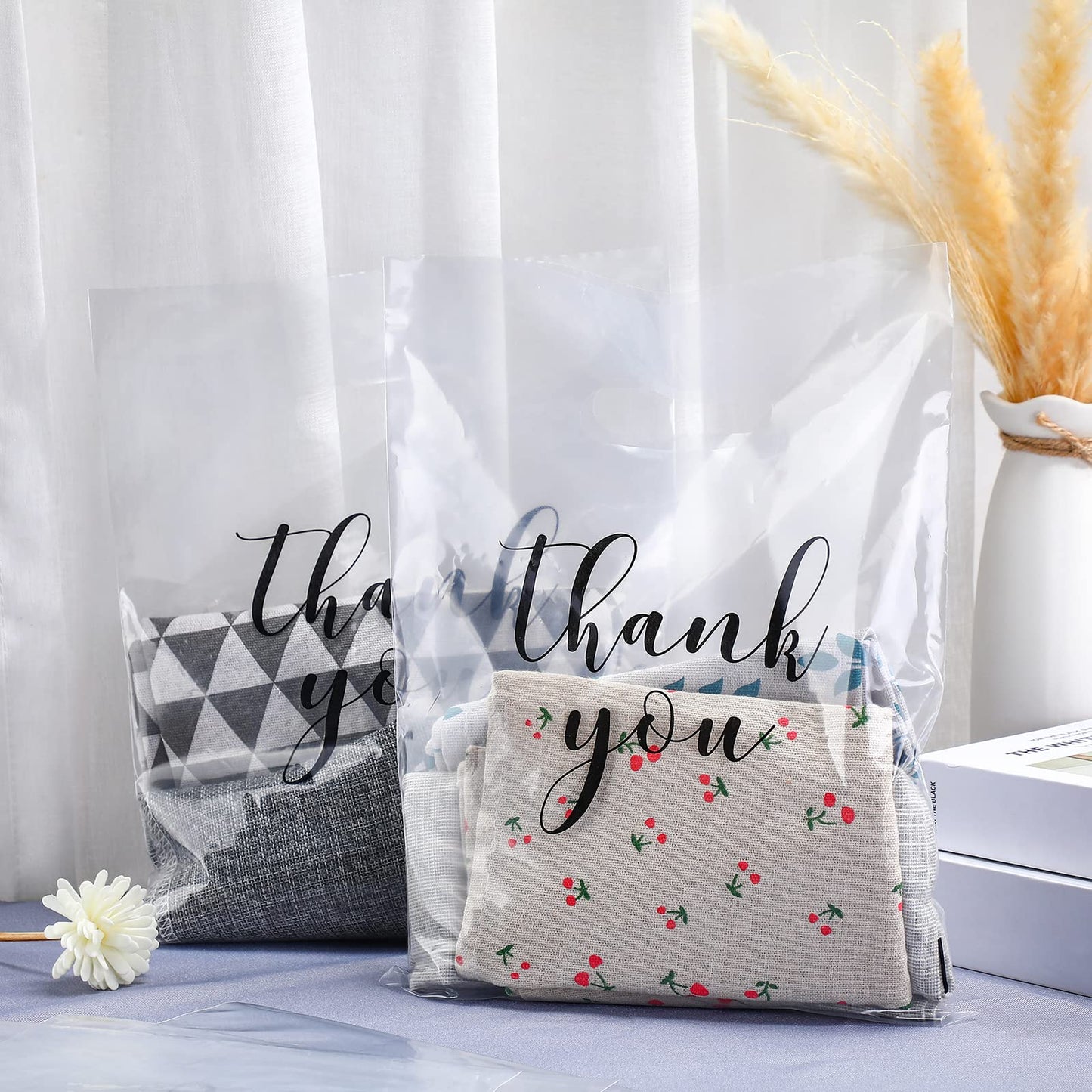 Crtiin 100 Pcs Clear Merchandise Bags Thank You Shopping Bags with Die Cut Handles T Shirt Plastic Packaging for Small Business Retail Boutique Stores Gifts (9 x 12 Inch)